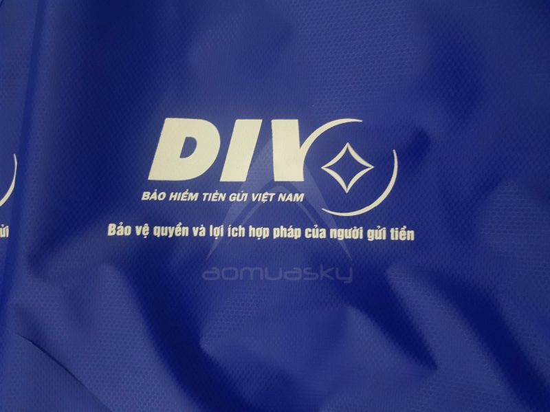Áo mưa cài cúc in logo DIV